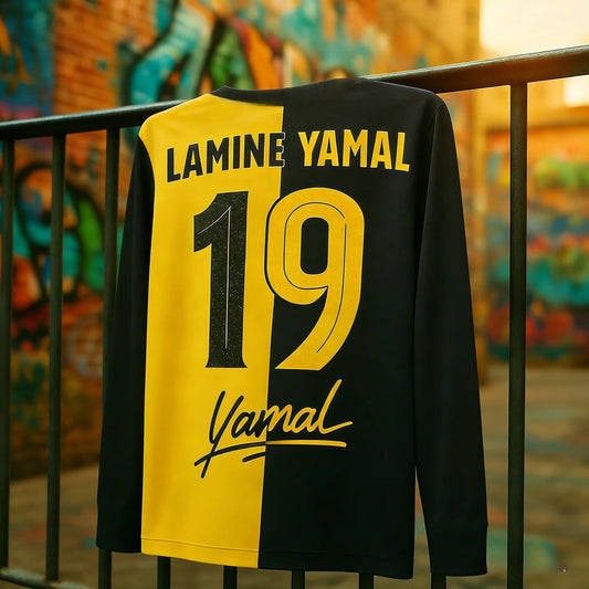 Black and yellow sports jersey with 'Lamine Yamal 19' printed on it, hanging against a graffiti-covered wall.