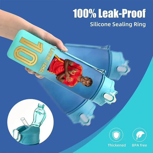 A hand holds a light blue water bottle with a printed Lamine Yamal graphic and the number 10. The image includes marketing text reading '100% Leak-Proof Silicone Sealing Ring,' a circular inset showing the straw opening, and icons noting 'Thickened' and 'BPA free' on a blue and teal background.