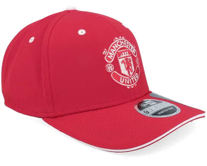 Red Manchester United cap with logo on a white background