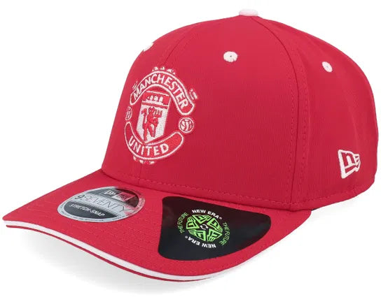 Red Manchester United cap with logo on a white background