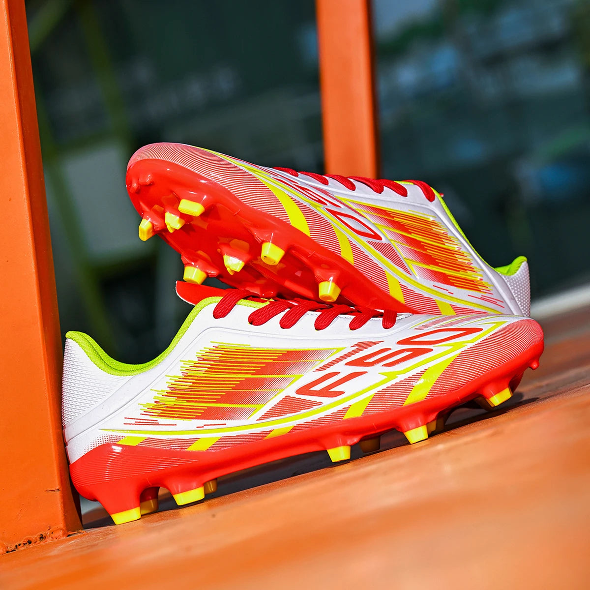 New durable and breathable football shoes with FG/AG studs suitable for all seasons of training and competition